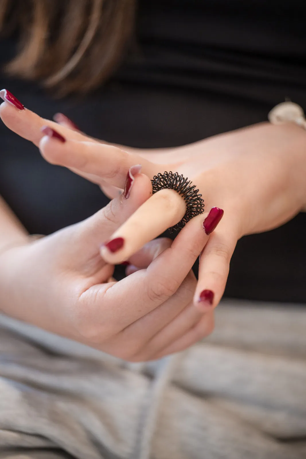 Massagering um Finger